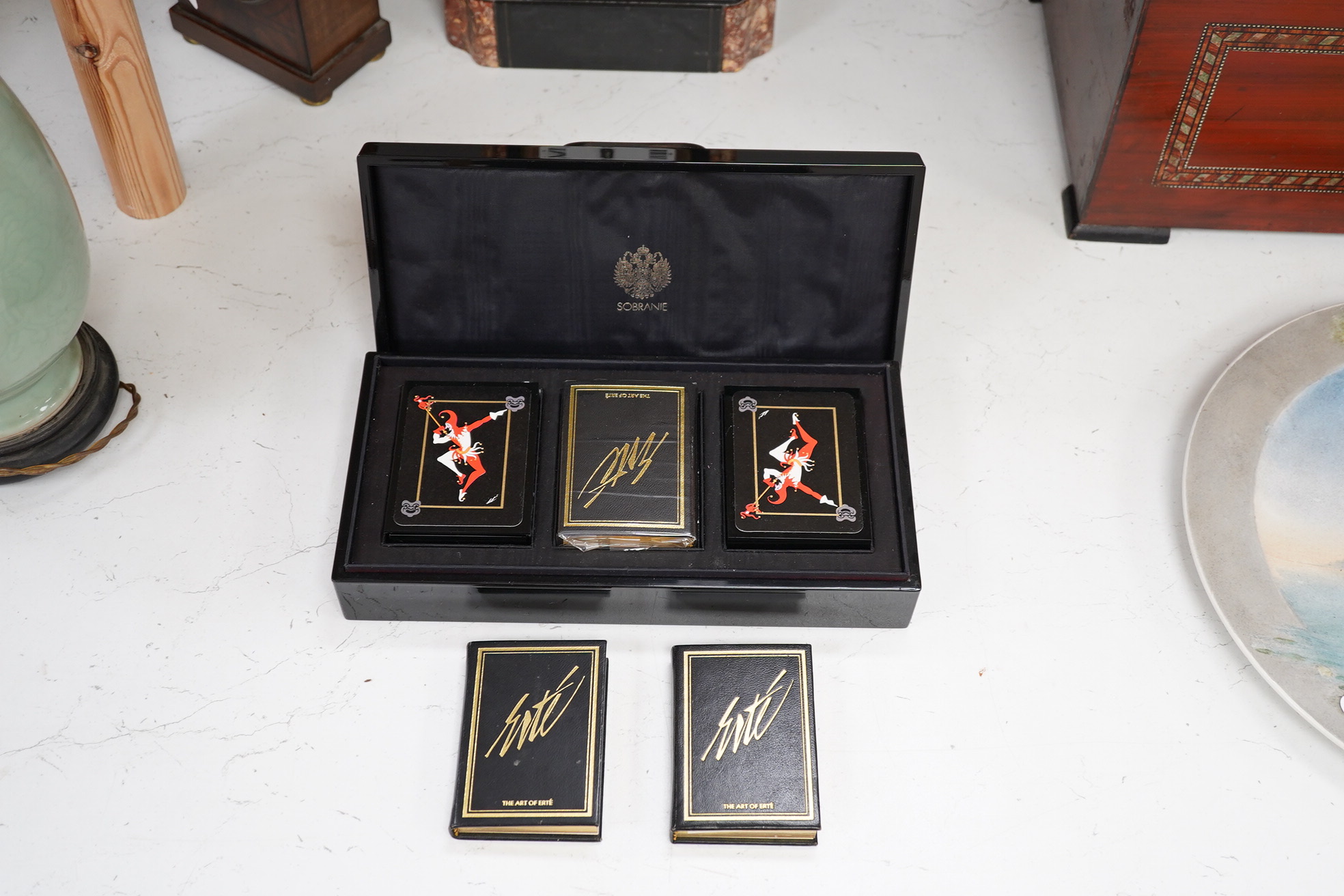 An Erte Bridge card set, boxed and two signed Erte books on his art, bridge box, 28.5cm wide. Condition - good